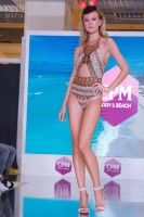 Модель в бикини на показе CPM 2018